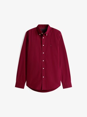 Chemise à manches longues bourgogne à boutons. Matière en coton, col anglais, boutons blancs, ourlet incurvé, petit logo sur la poitrine à gauche.