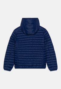 Veste matelassée bleu marine avec capuche, arborant un design en losanges, des poignets élastiques et une texture lisse, mettant en avant un style simple et fonctionnel.