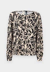 Langermet topp laget av lette materialer med et svart og beige blomstermønster, rund halslinning og tettsittende mansjetter.