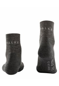 Grau gestreifte Socken mit verstärkten Fersen. Enthält das weiße Branding "FALKE" am Bund. Das Material wirkt weich mit einer strukturierten Oberfläche.
