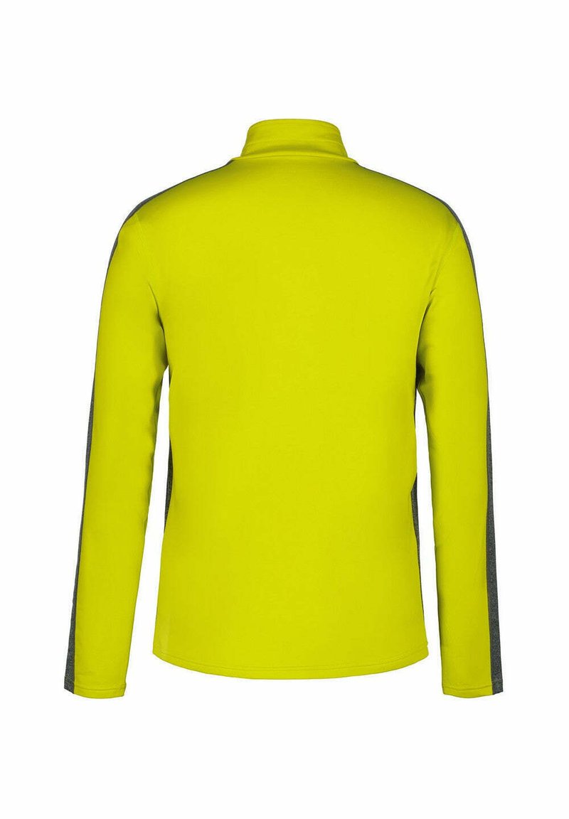 Langärmliges Shirt in leuchtendem Limettengrün mit schwarzen Seitenpaneelen. Der Stoff erscheint glatt; es hat einen hohen Kragen und einen abgerundeten Saum.