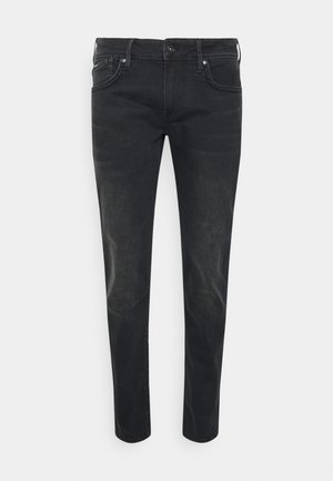 Černé džíny z denimu s úzkým střihem, designem na pět kapes, zapínáním na knoflík a jemným vyblednutím. Obsahují pevné prošití a hladkou strukturu.