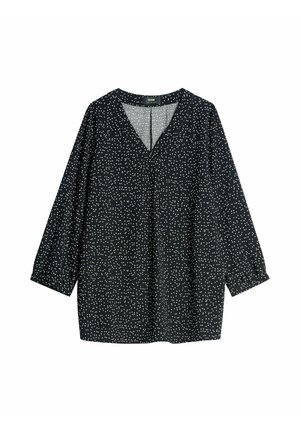 Czarna bluzka z długim rękawem w białe rozproszone groszki, z dekoltem w serek i lekko marszczonymi mankietami.