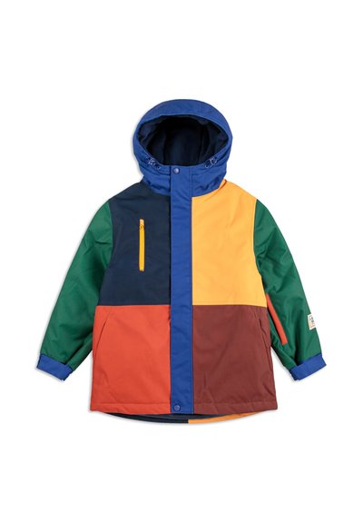 Veste colorée à capuche avec des panneaux bleus, verts, orange, jaunes et marron. Comprend une poche zippée et des poignets élastiques.