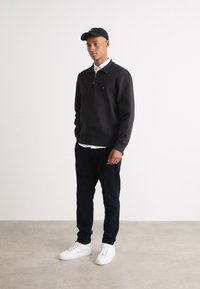 Tommy Hilfiger ESSENTIAL ZIP UNISEX - Melegítőfelső - black