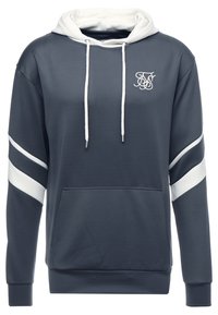 Granatowy hoodie z białym kapturem i sznurkami, białe ukośne paski na rękawach, kieszeń z przodu oraz małe białe wyszywane logo na klatce piersiowej.