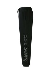 Schwarze Sweatpants aus Baumwollmischung mit einem elastischen Bund und Kordelzug, versehen mit "ED HARDY" in weißer Stickerei an der Seite.