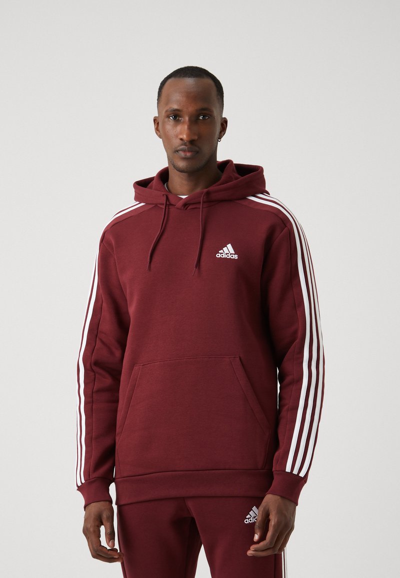adidas Sportswear ESSENTIALS 3 STRIPES - Felpa con cappuccio - shadow red