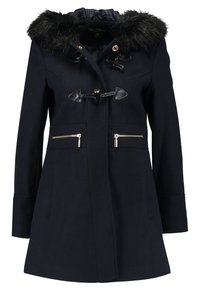 Navy coat with faux fur hood, two front zippered pockets, toggle closure, and a fitted design. Crafted from a textured fabric.