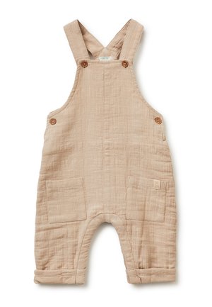 Beżowe, teksturowane bawełniane ogrodniczki dziecięce z regulowanymi szelkami, drewnianymi guzikami, dwoma przednimi naszywanymi kieszeniami i podwiniętymi mankietami.