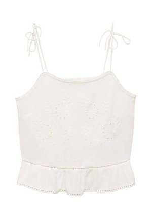 Bijela pamučna majica bez rukava s podesivim naramenicama, izvezenim cvjetnim uzorkom, volanastim rubom i čipkastim detaljima. 