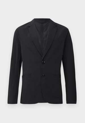 Zwarte blazer van gladde stof, met een sluiting van twee knopen, pieklapels en twee voorkruipzakken. Geen zichtbare patronen of accenten.
