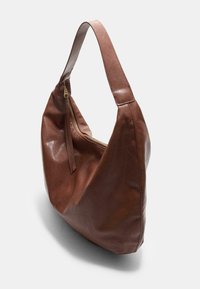 Brown leather hobo bag with a single long strap, rounded shape, and a zippered closure. Smooth texture with shiny accents.