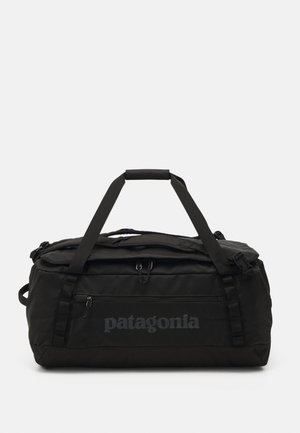 HOLE DUFFEL UNISEX - Turistinė kuprinė - black