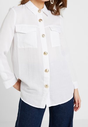 Blusa - white