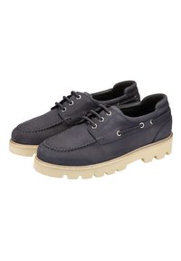 Marineblaue Lederschuhe mit Stickdetails, Schnürdesign, Metallösen und einer strukturierten cremeweißen Gummisohle.