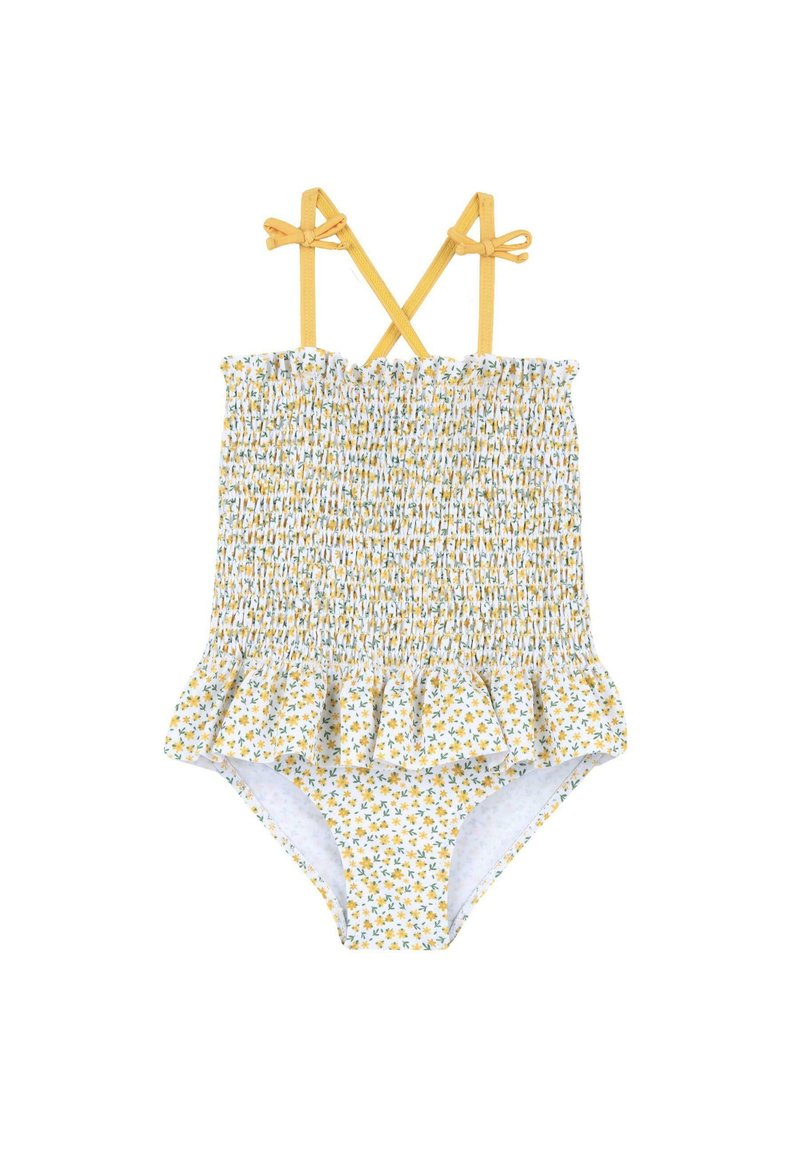 Maillot de bain une pièce floral jaune avec corsage froncé, bretelles croisées dans le dos et ourlet volanté à la jupe. Présente de petits motifs de feuilles vertes.