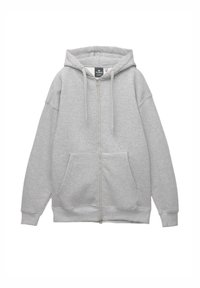Light gray zip-up hoodie with front pockets, adjustable drawstring hood, and ribbed cuffs and hem, laid flat on white background.