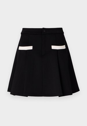 Black skirt with a flared design, featuring two front pockets with white accents, a button closure, and a smooth fabric texture.