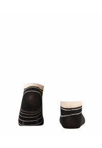 Schwarze Socken mit strukturierter Oberfläche, ausgestattet mit einem cremefarbenen Bündchen und dünnen horizontalen Streifen. Für einen niedrigen Tragekomfort konzipiert.