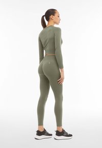 Freddy Leggings - beetle green