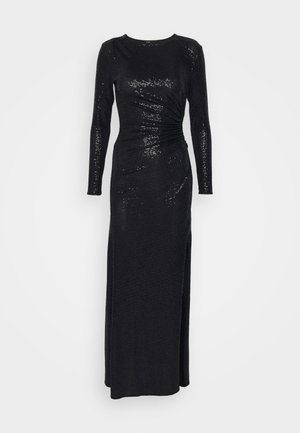 Abito lungo nero realizzato in tessuto testurizzato con paillettes, caratterizzato da maniche lunghe, un corpetto aderente e uno spacco laterale per facilitare i movimenti.