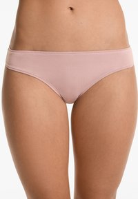 Light pink cotton bikini briefs with a smooth texture, low-rise design, and elastic waistband, featuring no visible hardware or patterns.