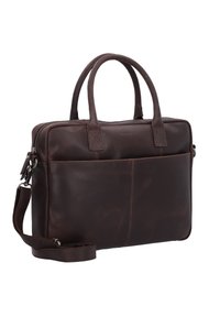Sac à ordinateur portable en cuir marron avec doubles poignées, bandoulière amovible, poche avant et texture lisse. Design minimaliste avec une finition élégante.