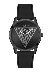 Must Black Guess käekell geomeetrilise kolmnurkse disainiga kellapinnal, hõbedased tunni- ja minutinäidikud, must silikoonist rihm ning hõbedane sekundinäidik.