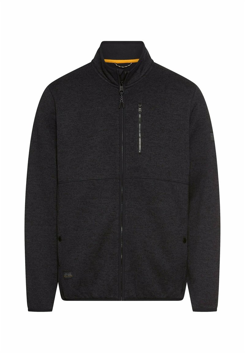 Dunkelgraue Zip-Jacke mit hohem Kragen, strukturiertem Stoff, Fronttaschen und einem kleinen Logodetail am Ärmelsaum. Eingeschnittene Brusttasche mit Reißverschluss.