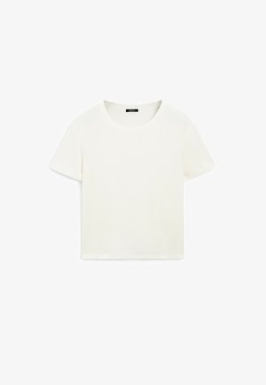 Hvid croppet t-shirt lavet af blød bomuld, med rund halsudskæring og korte ærmer, med en glat tekstur og uden mønstre eller udsmykninger.