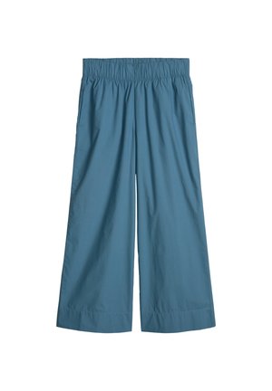 Pantalon court bleu à jambes larges avec taille élastique, fabriqué en tissu léger.