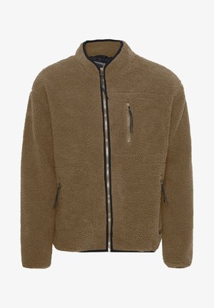 Béžová fleecová bunda so zipsom vpredu. Má vysoký golier, kontrastné čierne zipsy, dve bočné vrecká a náprsné vrecko. Mäkkučká textúra.