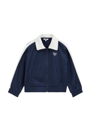 Navy blue zip-up jacket with white collar and stripes on sleeves, elastic cuffs, and a small white heart design on the left chest.