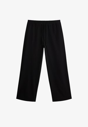 Pantalons larges noirs en tissu lisse, dotés d'une taille élastique et d'un cordon de serrage ajustable. Sans motifs ni accents distinctifs.