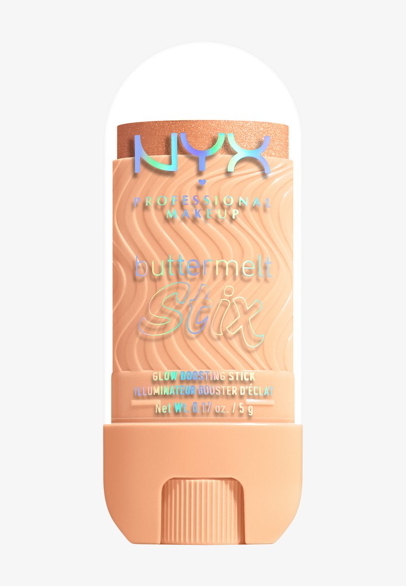 Stick éclatant NYX Buttermelt Stix dans un étui pêche avec un motif en vagues et un texte holographique. Poids net 5 g indiqué.