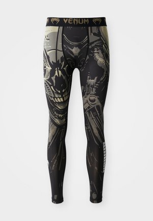 Black and gray compression leggings with a detailed robot or cyborg face design and "VENUM" logo on the waistband.