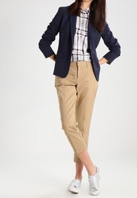 GAP Tygbyxor - beige