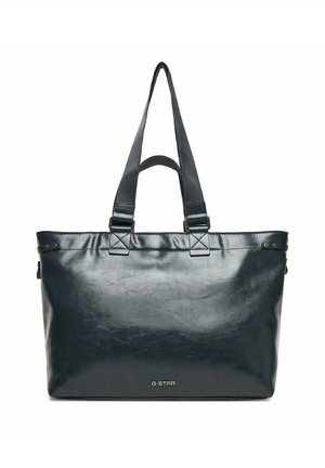 Bolso tote de cuero negro con dos asas y logo G-STAR centrado cerca de la parte inferior, mostrado sobre un fondo blanco.