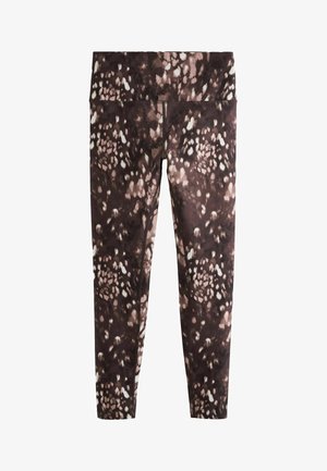 Pruunid leggingud, millel on tekstuuriline abstraktne muster beeži ja valgete aktsentidega, valmistatud venivast ja pehmest kangast. Kõrge talje disain.