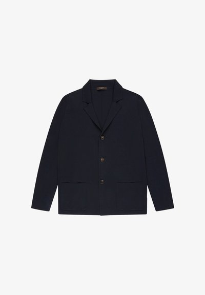 Navy blazer with a notched lapel, four buttons, and two front pockets. Made from a textured fabric for a structured look.