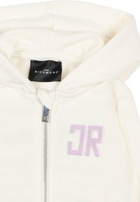 Felpa con cappuccio color crema con zip, dalla texture morbida, con logo "JR" ricamato in viola e etichetta nera con la scritta "John Richmond" all'interno del colletto.