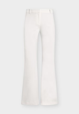 Άσπρο παντελόνι ψηλόμεσο με καμπάνα, θηλιές για ζώνη και φερμουάρ μπροστά, σε ανοιχτό φόντο.