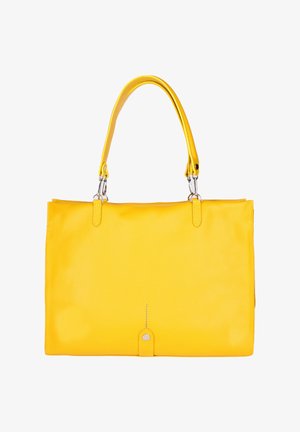 Sac à main en cuir jaune avec une bandoulière amovible unique et un petit détail métallique hexagonal près du centre en bas.