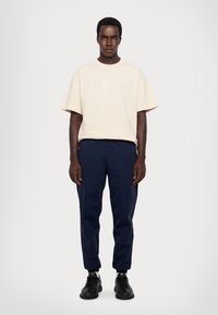 EA7 Emporio Armani UNISEX - Apdrukāts T-krekls - white