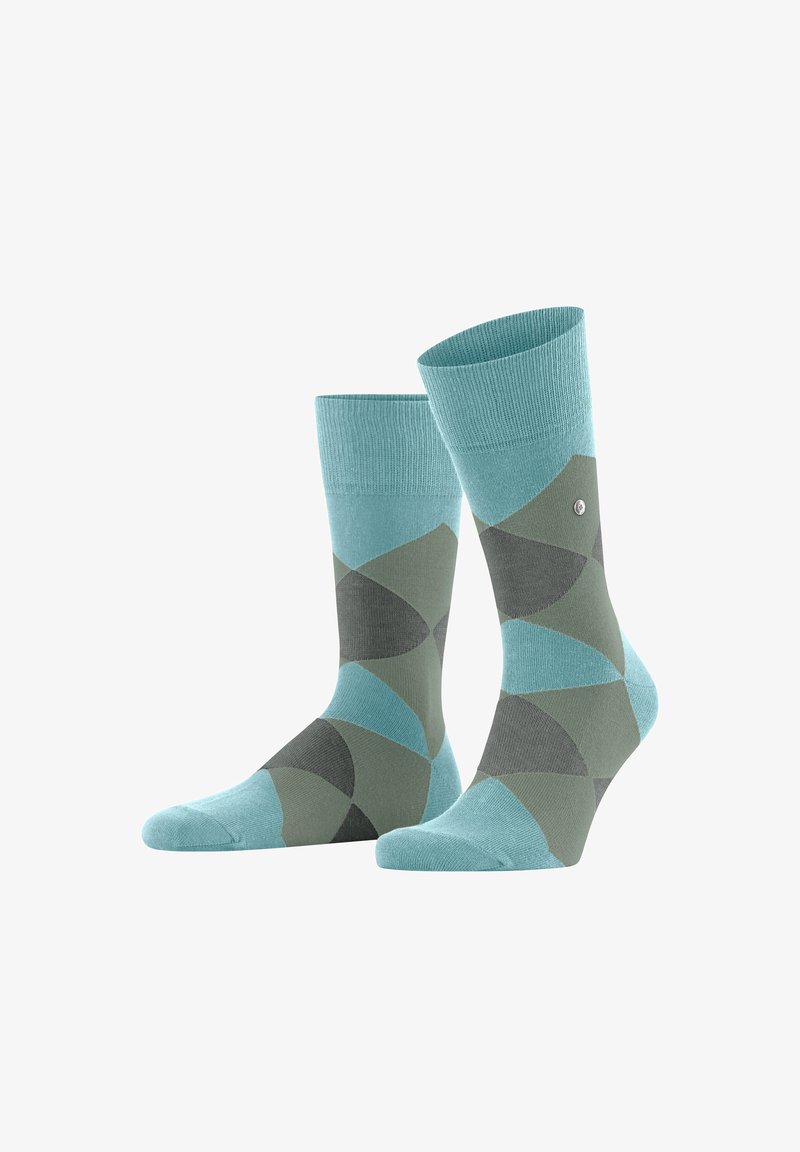 Des chaussettes à motifs teal et gris présentent des formes géométriques avec une touche de bleu clair. Les bords supérieurs sont côtelés, ajoutant de la texture au design.