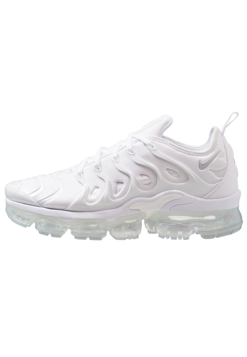 White athletic shoe featuring a textured upper, distinctive wave-like design, and a transparent air-cushioned sole.