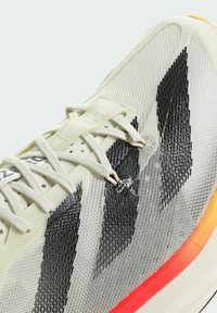adidas Performance ADIOS PRO - Apavi skriešanai pa asfaltu - ivory   core black   crystal sand