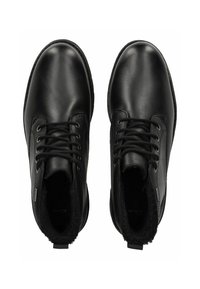 Botas de cuero negro hasta el tobillo con punteras redondas, diseño de cordones y un interior esponjoso para mayor calidez, con un exterior texturizado y suelas resistentes.