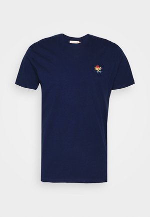 Marineblaue Baumwoll-T-Shirt mit klassischem Rundhalsausschnitt und kurzen Ärmeln. Enthält ein kleines gesticktes Cartoon-Design auf der Brust.